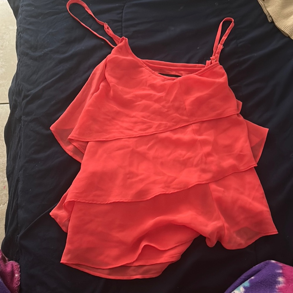 pinkish red cross over top